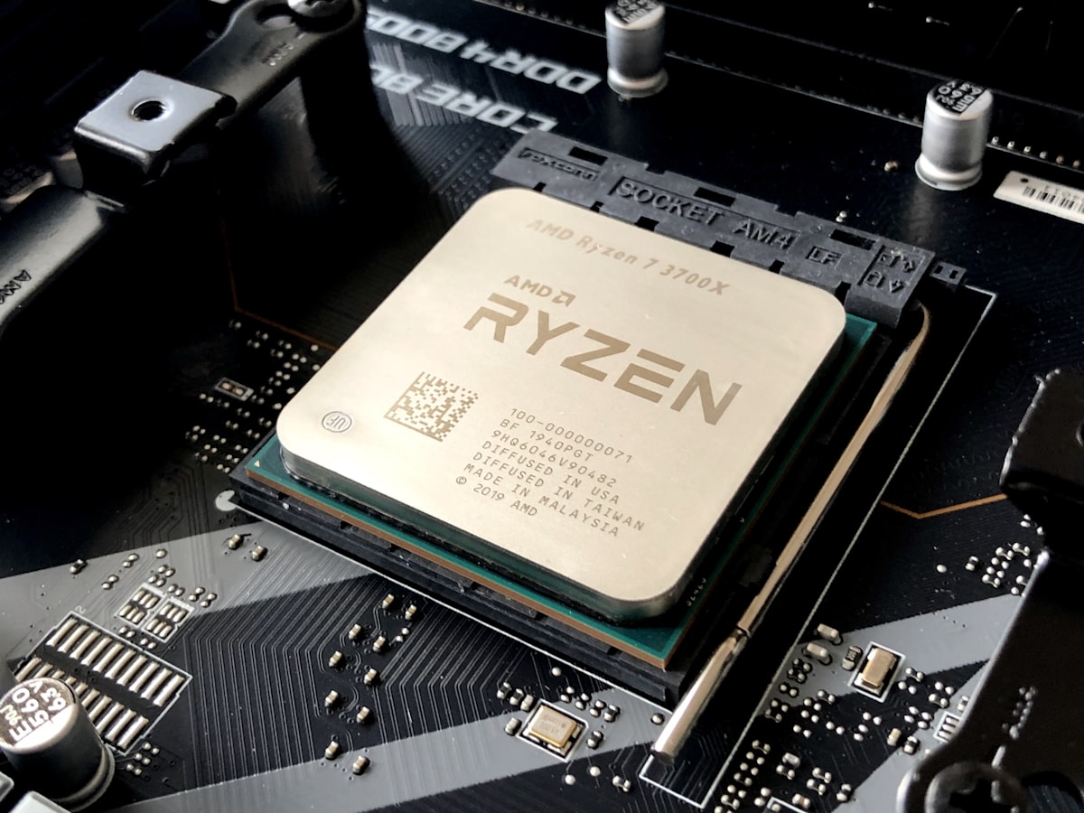 RAM modules on an anti-static surface next to a motherboard